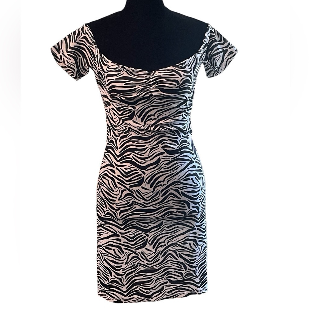 Divided Woman’s zebra print form fitting dress, on or off shoulders, size 8​‎